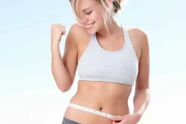 woman happy after fat reduction treatment Abbots Langley