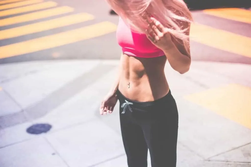 Woman with toned stomach after LA-EMS Body Sculpting Treatment Abbots Langley 
